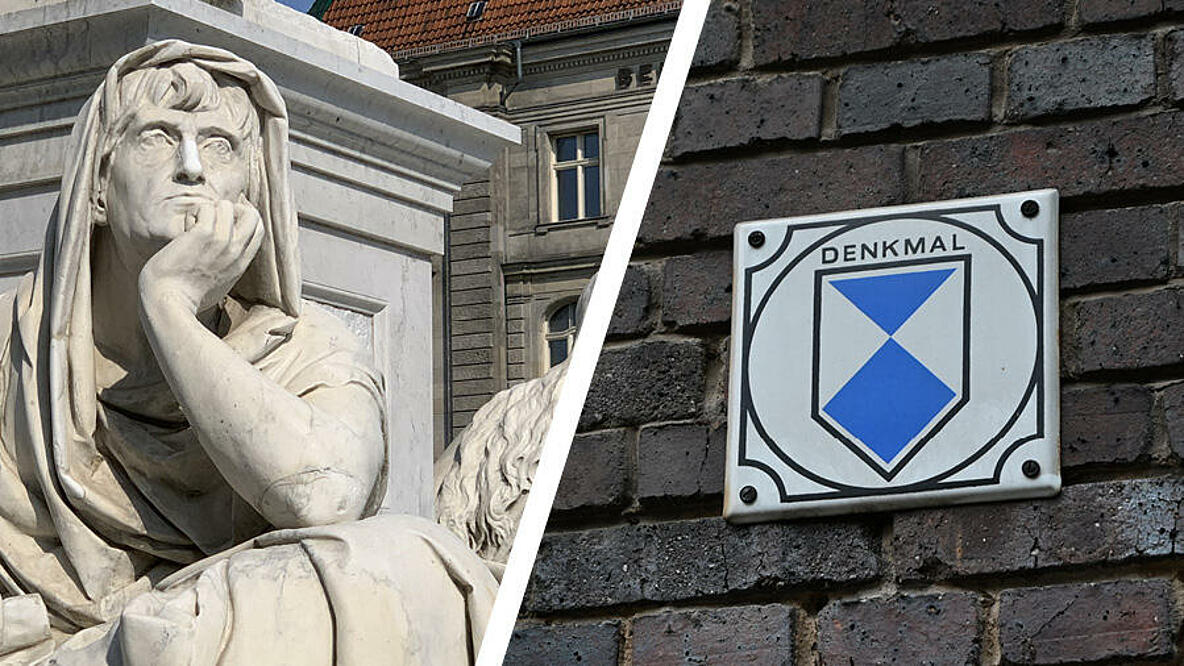 Figur auf Denkmal und Schild Denkmalschutz